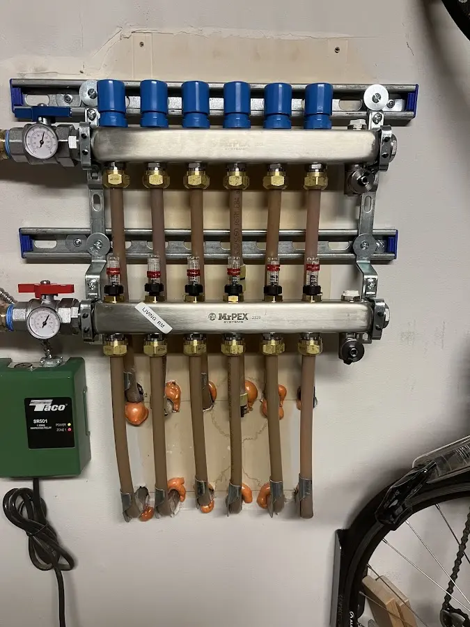 Plumber performing Leak Detection at a residential property in Guilford